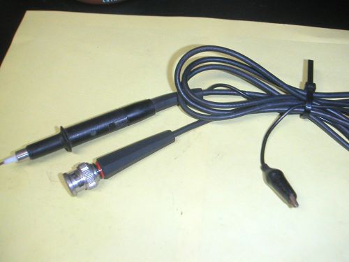 unmarked scope probe with three position range switch and ground clip