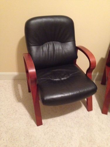 Leather visitors chair black with cherry finish wood base and arms-assembled for sale