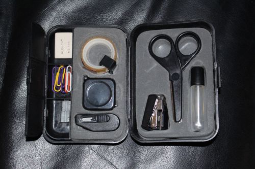 Travel Desk with scissors stapler, razor knife, tape measure....