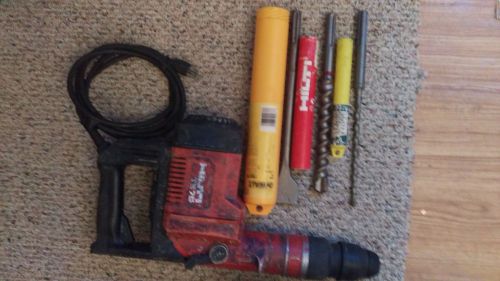 HILTI HAMMER DRILL TE75 WITH 7 BITS (valued at 180.00)