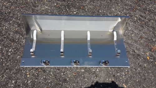 Stainless steel shelving unit w/ mop holders for sale