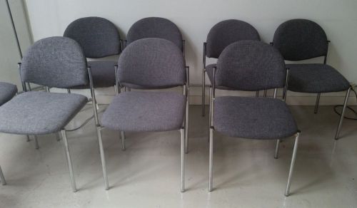 Lot of 12 Gray Stackable Chairs with cushioned seating