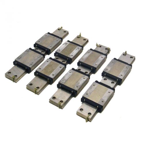 Lot of (4) nsk le15 wide linear motion guide rails with (8) le15 bearing blocks for sale