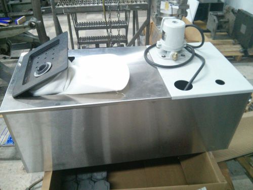 Coolant pump and tank