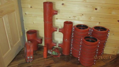 Large mixed group cast iron gruvlok victaulic rigidlite industrial pipe fittings for sale