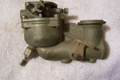 antique briggs and stratton carburetor part # 393753 NLA