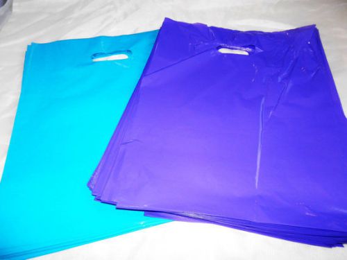 100 12x15 purple and teal blue low-density plastic merchandise bags w\handles for sale