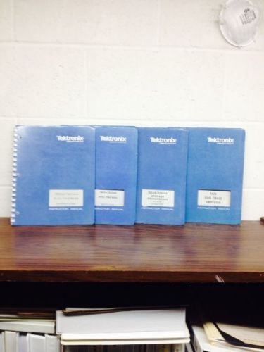 Four Tektronix 7623A manuals for scope and three plugins