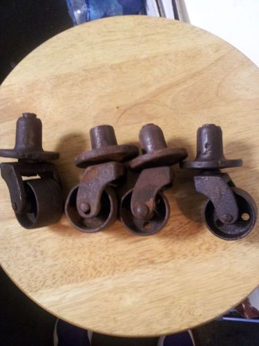 4 ANTIQUE VINTAGE MATCHING  CAST IRON INDUSTRIAL CASTER CART TABLE WHEELS