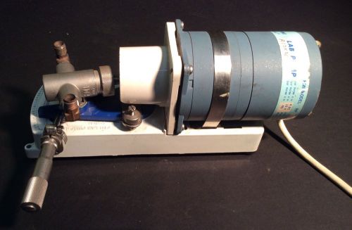 FMI lab pump Model RRP, RP-SY with 3/8&#034; piston and vernier adjustment