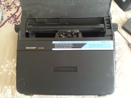 Sharp PA-3100II Portable Electronic Intelliwriter Typewriter Two NEW Cartridges