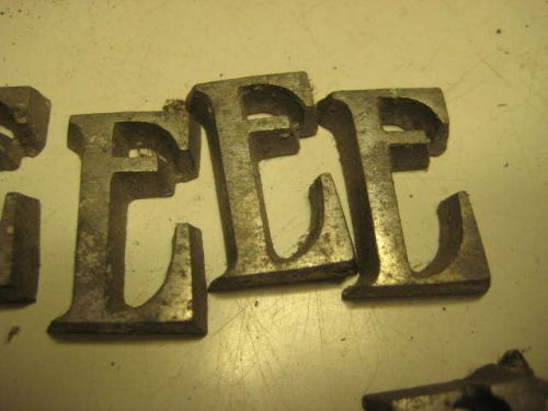 27 small metal letters quarter size