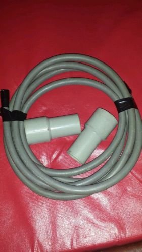 Carpet cleaning solution hose with vacuum hose ends