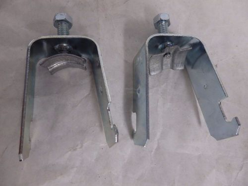 Lot of 77 erico caddy single piece strut clamps for conduit sch16 for sale