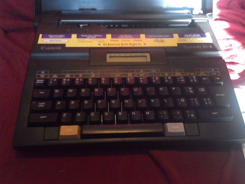 Vintage Canon Typestar 10-2 Electric Battery Operated Typewriter w Manual &amp; Lid