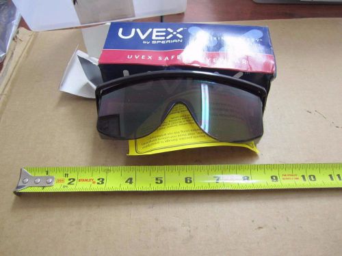 Uvex smoked lens wrap around safety glasses for sale