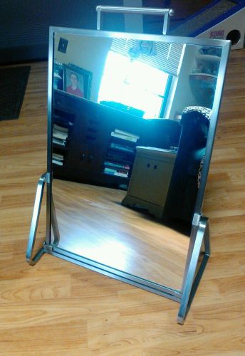 Vintage floor shoe mirror heavy Polished stainless steal Fantastic Condition.
