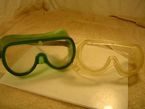 2 pair of used industrial safety goggles.