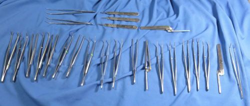 Lot of 25 Dental Instruments. Forceps and scapel holders