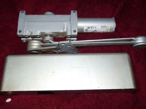 Lcn 4111 door closer with beauty cover / new screws. (used) good working order. for sale