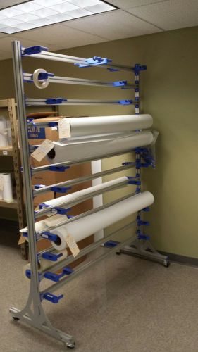Storage rack for large format printer and materials