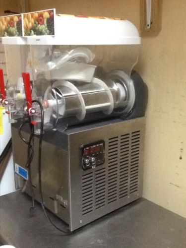 Frozen drink slush machine.( granita dispenser) use 30 days model xrj-15x2 l