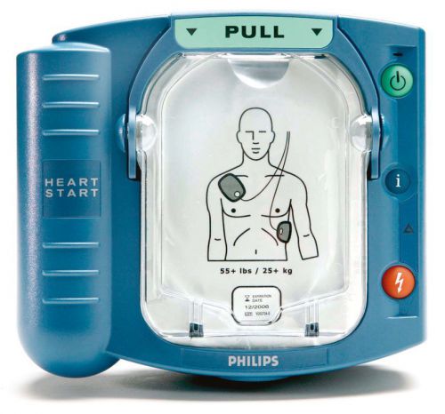 Philips HeartStart AED (warranty) with battery, pads, case and wall cabinet.