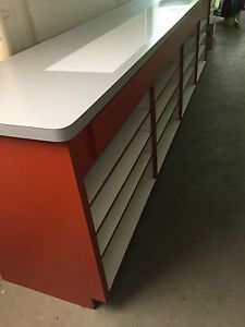 Custom counter / cabinet with light table and adjustable shelves, storage