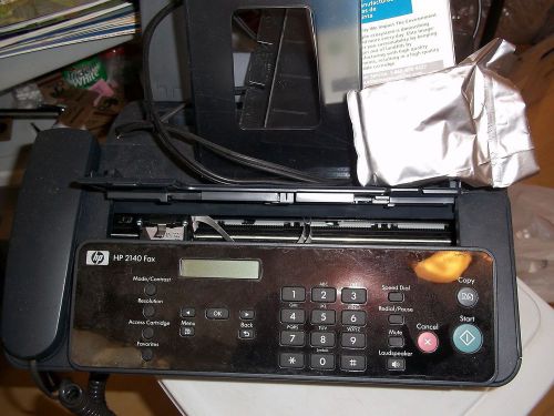 HP2140 FAX MACHINE + HP701 INK + SPARE PAPER GUIDE NOT TESTED DOES POWER ON L@@K