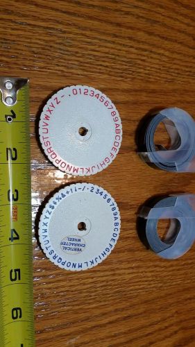 Two (2) VINTAGE Dymo M-6 character wheels with 2 tape rolls