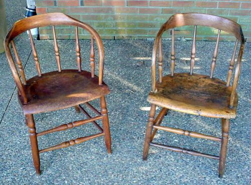 Two hard wood contemporary curved back chairs for sale