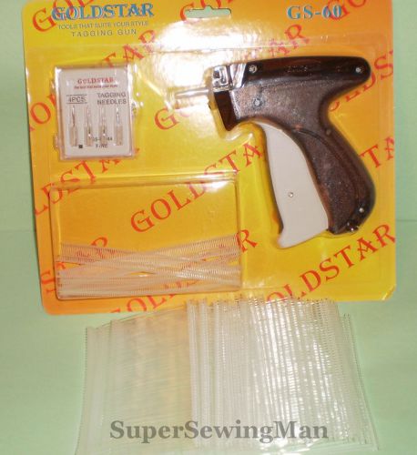 Fine clothing tagging tagger tag gun with 2000 barbs + 5 needles for sale