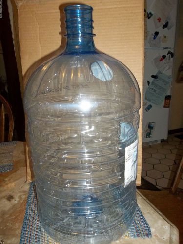 Used plastic 4 gallon water cooler bottle jug container for sale