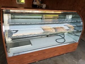 Bakery display case,cooled,refrigerated,Large curved glass front ,floor model