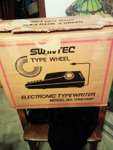 Nib swintec 1186 cmp electronic typewriter &#034;made in japan&#034; $549 pd.in 1986 for sale