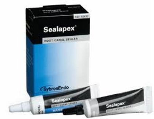 Sealapex non-eugenol, calcium hydroxide polymeric resin based canal sealer.