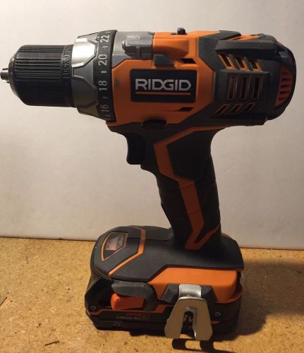 RIDGID 18V DRILL AND WORK RADIO INCLUDED A BATTERY AND CHARGER BUNDLE