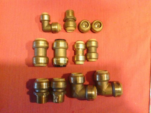 lot of 12 pieces new sharkbite water fittings plumbing coupling, elbow, caps