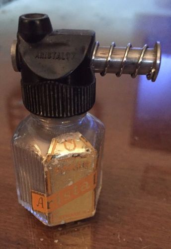Empty vintage baker aristaloy bottle w spring connector adapter dental equipment for sale