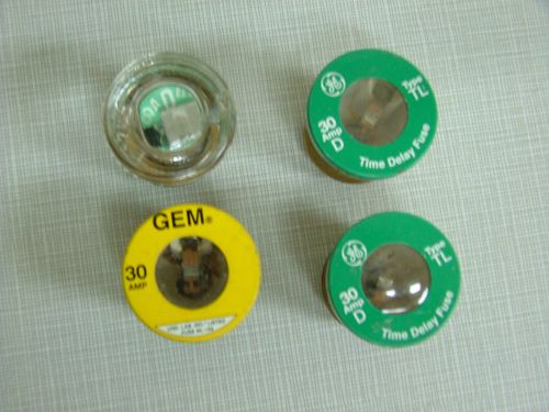4  Fuses 30 amp,  2 GE, 1 Gem, and 1 Glass unknown. Good Condition.