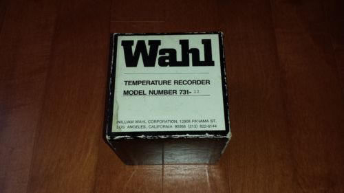 Wahl 24-hour Temperature Recorder Model 731-12, with key and recording charts.