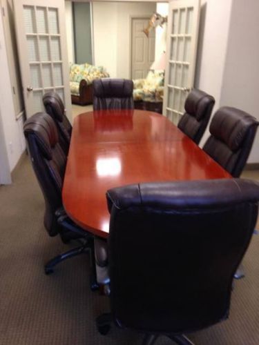 Beautiful Wood Conference table with 6 rolling chairs