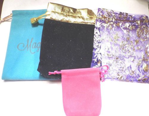 Set of 4 assorted gift bags/pouches, 3 different sizes. gently used for sale