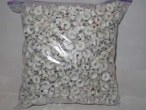 Gallon Freezer Bag full of Retail Size Rings.  S, M, L, XXL, 2X