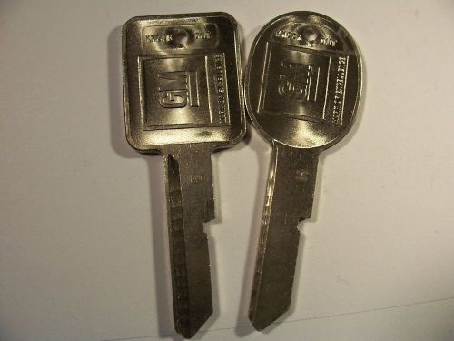 1 SET   OEM  E &amp; H  GM  KEY BLANK  WITH KNOCKOUT IN PLASE  UNCUT   ORIGINAL