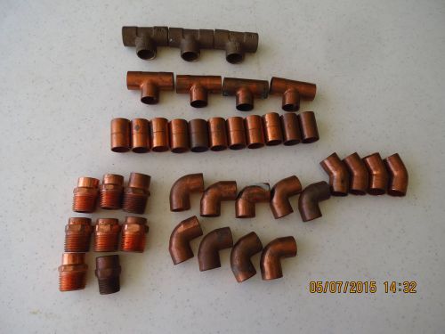 Big lot of 1/2 inch brass and copper fittings - 39 pieces in all for sale