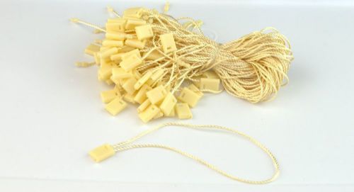 7&#034;1000 pcs yellow hang tag nylon string flat head snap lock loop fastener ties for sale