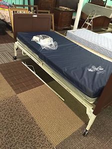 hospital bed barely used ivacare electric bed and solace therapeutic mattress.