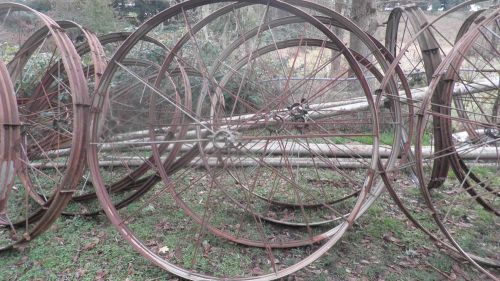 Spoke wheel~iron~6 ft. diameter~for irrigation line~or use as yard/field art for sale
