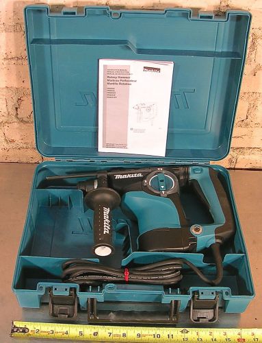 Makita model no. hr2811f, rotary hammer drill kit with plastic kit box for sale